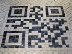 В Лиссабоне на тротуарах были размещены мозаичные QR-коды с туристической информацией